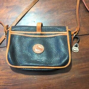 Older East West Flap Dooney and Bourke Black and Brown Leather Crossbody Bag